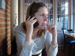 A woman talking on a cell phone.