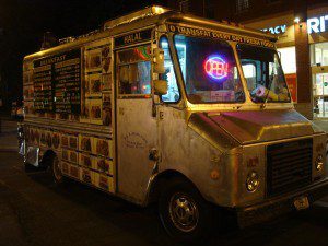 A silver food truck.