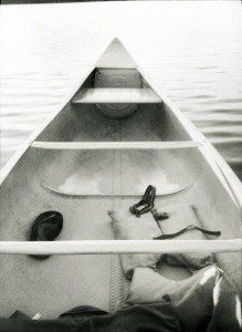 A black and white photo of a canoe.