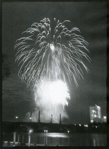 A black and white photograph of a fireworks display.