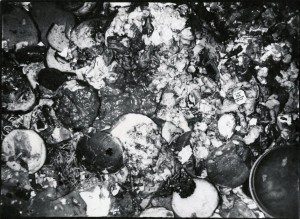 A black and white photograph of a pile of garbage.