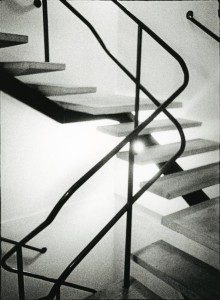 A black and white photo of a staircase.