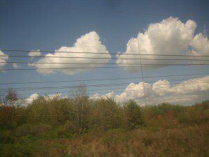 Clouds in the sky above a field.